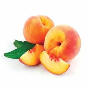 two peaches and slices of peaches