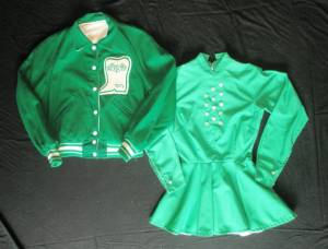 green jacket and uniform of Bryan Adams Belles