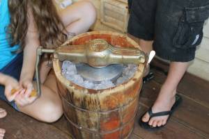 kids hand-cranking ice cream