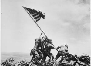 Harlon Block and fellow American soldiers raising flag at Mt. Surabachi, March 1945 - Texas World War II Heroes