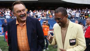 Dick Butkus and Gale Sayers laughing together