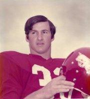 Dickey Morton in red University of Arkansas uniform