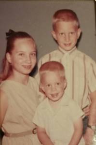 Carol with her two brothers
