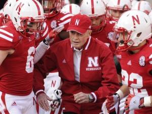 Tom Osborne and Nebraska football players