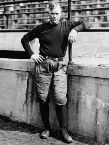 Fielding Yost posing in football uniform