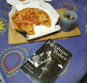 pizza and book on Josephine Baker