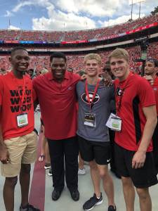 Herschel Walker, Matt Boling and two others at Georgia football game