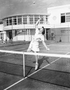 Babe Didrikson plays tennis