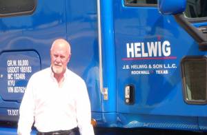 James Helwig in front of blue truck